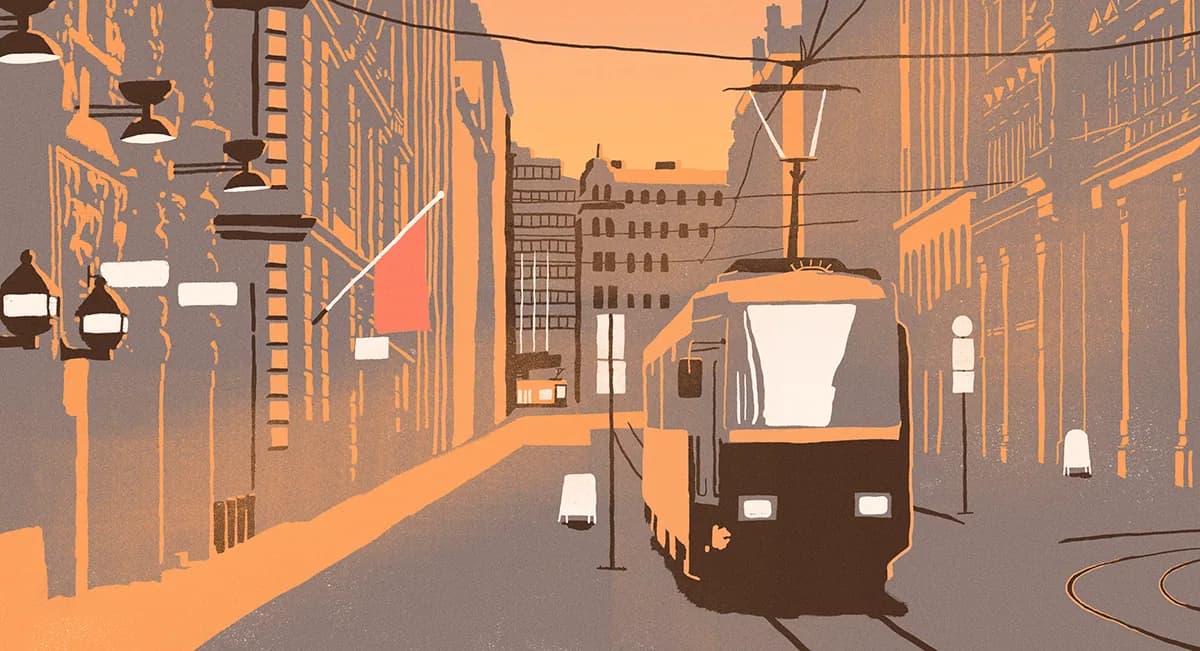 Illustration of a Helsinki street in warm orange evening light, with a tram approaching between stone buildings and hanging street lamps.